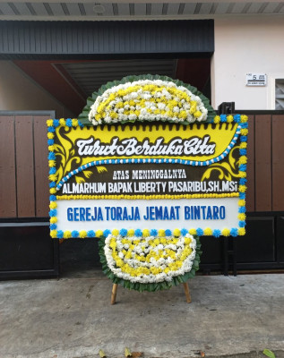 Papan Bunga Duka di Waliabuku